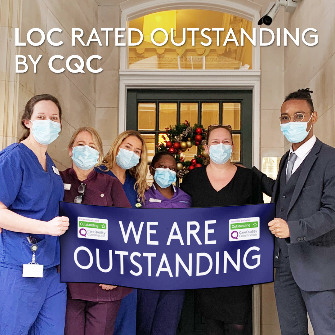 LOC team with award banner